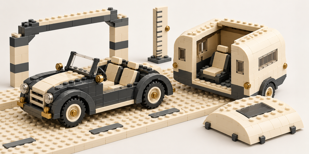 Brick-built car and open camper shell with a separate roof beside a clearance arch and measuring rail