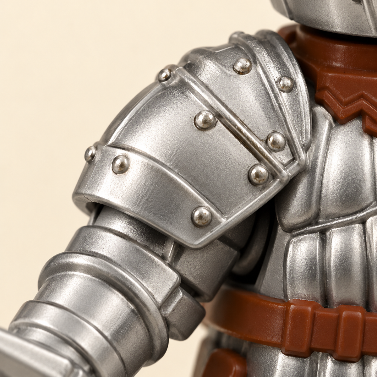 Attached riveted shoulder armor — Silver-Armored Sword Knight MOC Minifigure